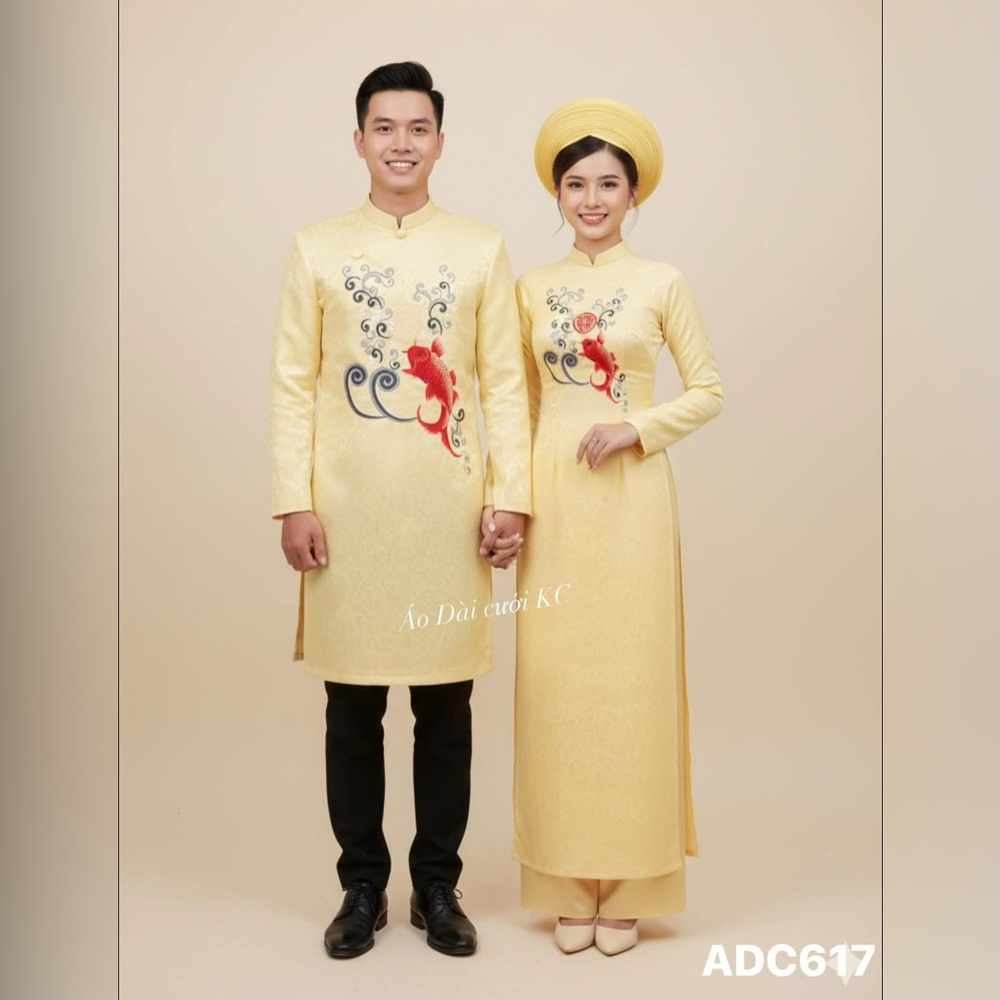 Elegant Yellow Áo Dài with Red and Blue Embroidery